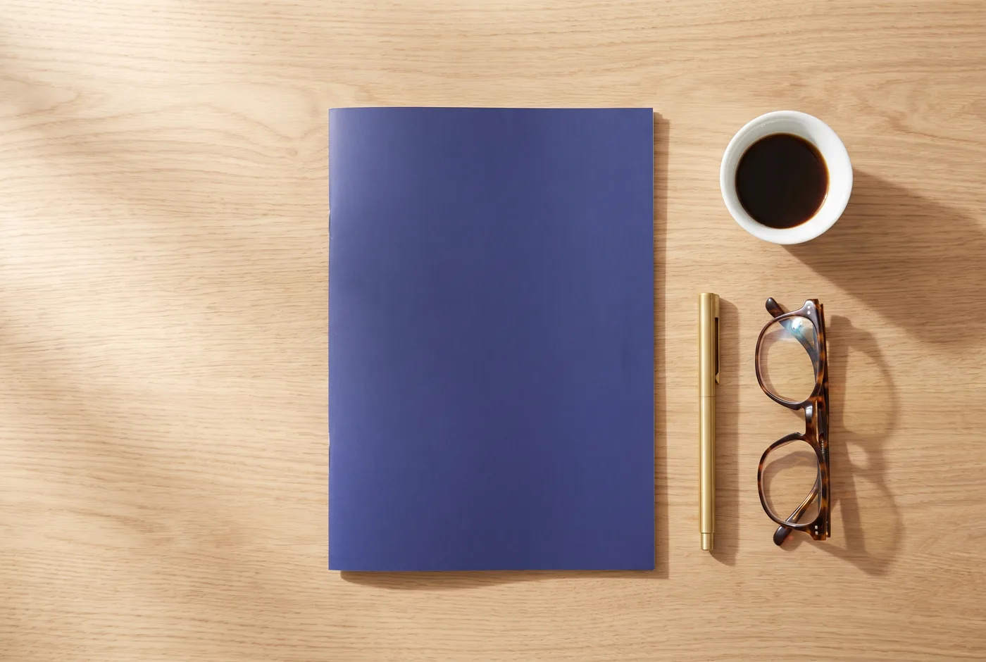The HeyServo partner brochure on a desk